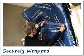 Furniture securely wrapped in protective packing materials before an international move