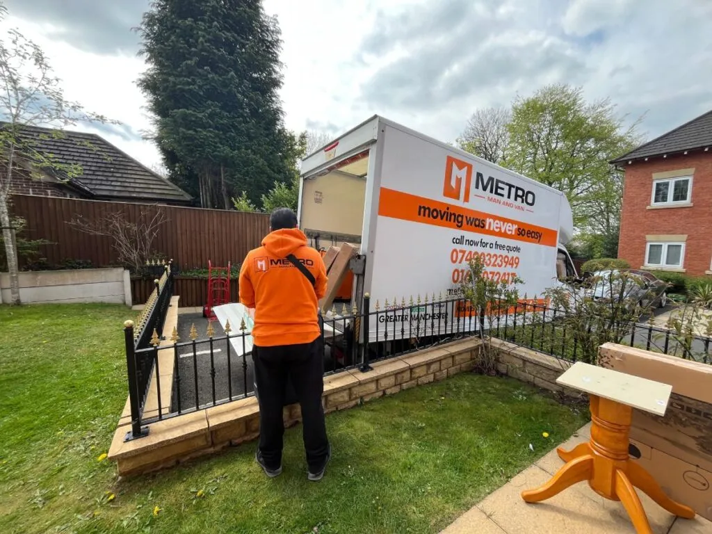 Moving truck outside house